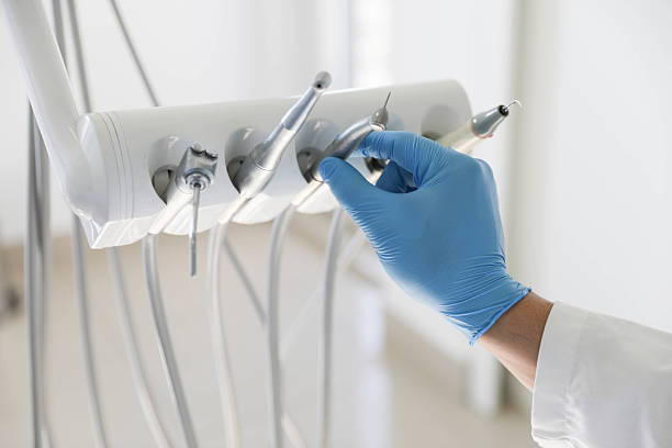 Professional Tooth Extraction technician working in Long Beach, MD
